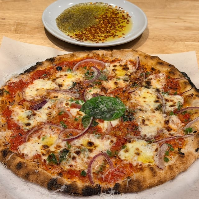 NG Sizzle Drizzle Pizza.